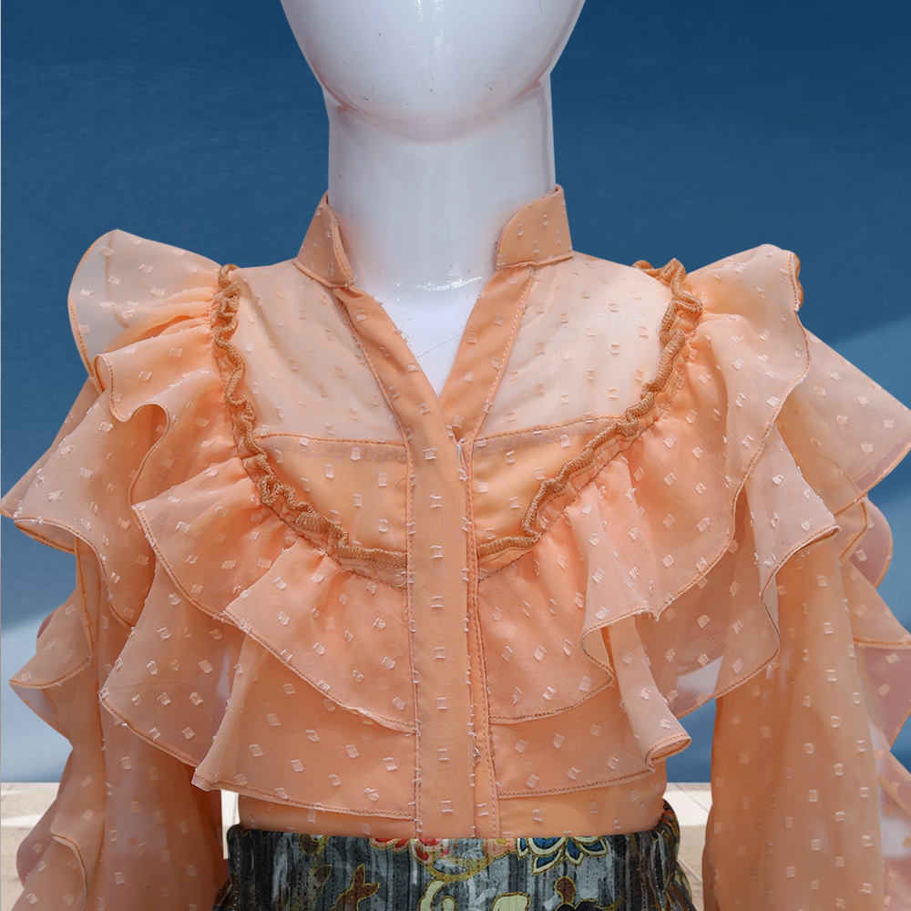 peach frilly top and printed lehenga