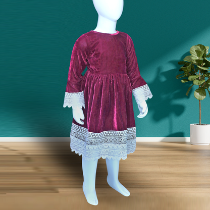 burgundy velvet dress with long sleeves and a flared skirt