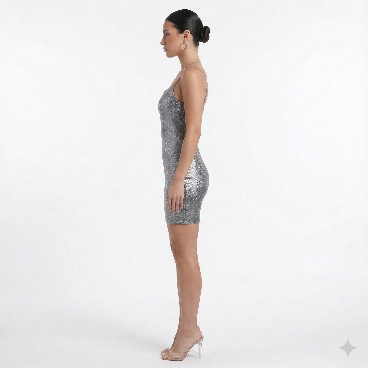Stunning halterneck bodycon dress adorned with elegant diamante details, featuring a sleek black cowl shape. | cowl shape