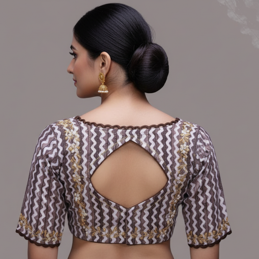 White and Maroon design blouse rings neck line.